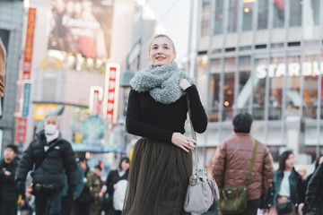 Fototapeta premium 日本・東京・渋谷を観光する女性