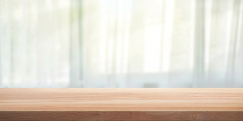 Wood table top with blurred background. 