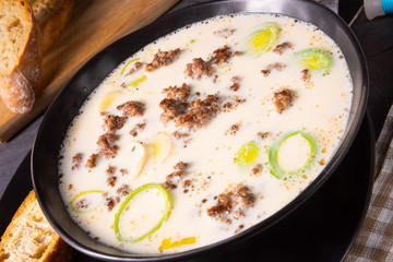 Delicious cheese and leek soup with minced meat