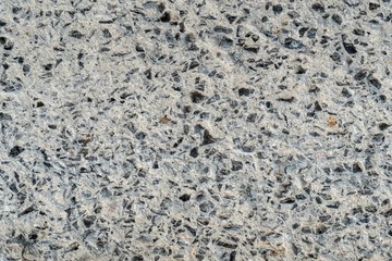 Photo of concrete wall with crack surface.