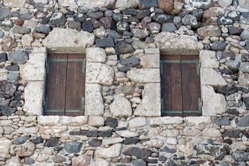 Steinmauer Textur mit Holztüren als Hintergrund für Composing