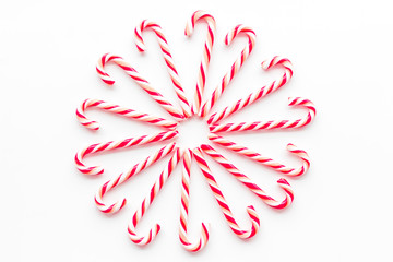Christmas candy cane pattern on white background top-down