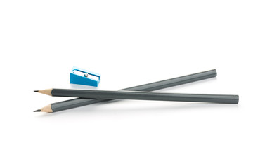 Two new gray graphite pencil triangular shape  with sharpener isolated
