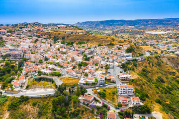Obraz premium Cyprus. Pissouri village. City on the hills. Streets of the village of Pissouri top view. Pissouri resort with a drone. Travel to cities Cyprus. Single tour to the Republic of Cyprus. Tourist Hotels