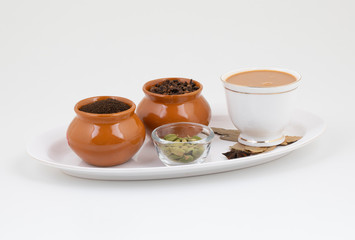 Indian Popular Drink Masala Chai or Masala Tea With Toast on White Background