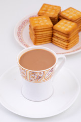 Masala Tea With Cookies on White Background