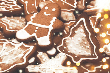 Christmas gingerbread cookies with icing and lights. Holiday homemade cookies