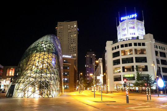 Night view of the old Philips factory building and modern futuristic building in the city centre of Eindhoven, Netherlands