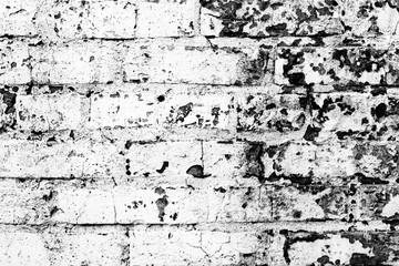 Texture of a brick wall with cracks and scratches which can be used as a background