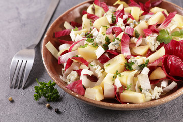 chicory salad with blue cheese, apple, walnut and sauce
