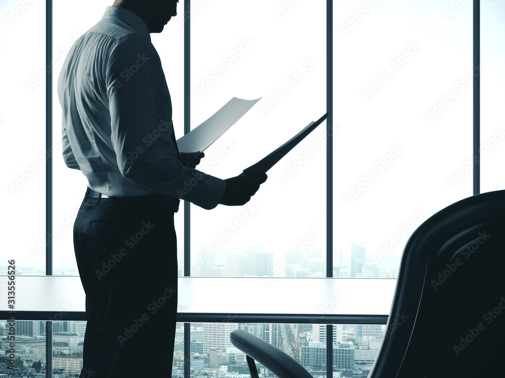 Wall mural Businessman working in office