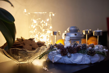 Christmas decoration angels with decorated candles and christmas cookies