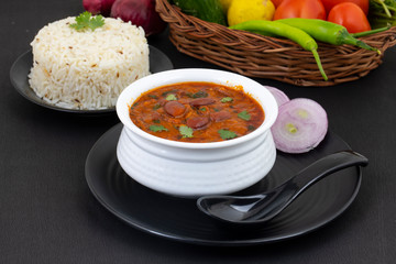 Rajma Chawal or Rajma Jeera Chawal (Rice) is a Traditional North Indian Food, Consisting of Cooked Red Kidney Beans in a Thick Gravy with Spices. Served with Jeera Rice