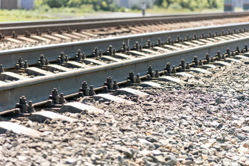 railway track, gravel along the edge of the railway
