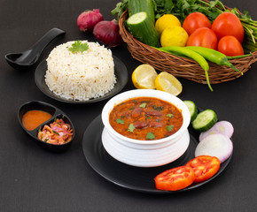 Rajma Chawal or Rajma Jeera Chawal (Rice) is a Traditional North Indian Food, Consisting of Cooked Red Kidney Beans in a Thick Gravy with Spices. Served with Jeera Rice
