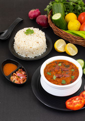 Rajma Chawal or Rajma Jeera Chawal (Rice) is a Traditional North Indian Food, Consisting of Cooked Red Kidney Beans in a Thick Gravy with Spices. Served with Jeera Rice