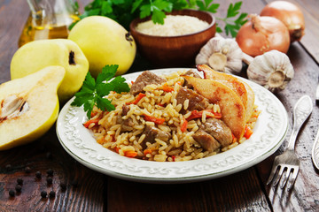 Pilaf with meat and quince - 313559788