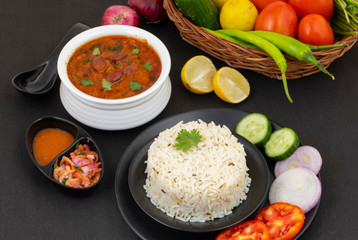 Rajma Chawal or Rajma Jeera Chawal (Rice) is a Traditional North Indian Food, Consisting of Cooked Red Kidney Beans in a Thick Gravy with Spices. Served with Jeera Rice