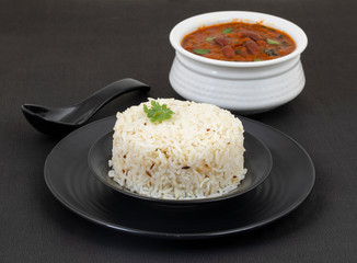 Rajma Chawal or Rajma Jeera Chawal (Rice) is a Traditional North Indian Food, Consisting of Cooked Red Kidney Beans in a Thick Gravy with Spices. Served with Jeera Rice