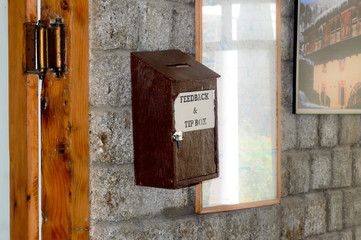 Wooden Suggestion or Complaint Box or Letter Box mounting on doorway Wall of a tourist resort hotel reception Home Office to lock and secure suggestions ballots mails of customer service feedback.