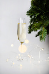 Glass of champagne isolated on a white background. Happy New Year 2020! Christmas and New Year holidays background, winter season.