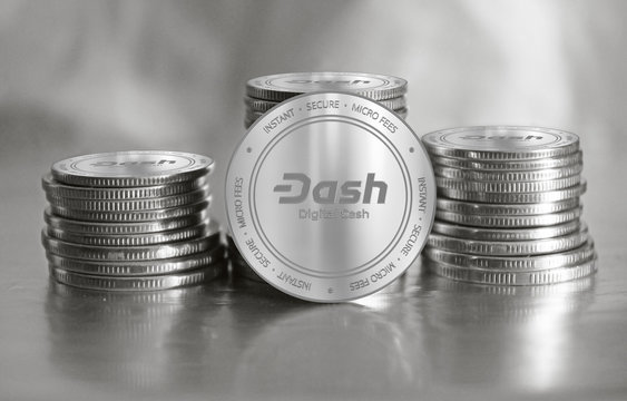 DigitalCash (DASH) digital crypto currency. Stack of silver coins. Cyber money.