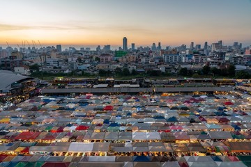 Sunset  view of the Train Night Market Ratchada. Train Night Market Ratchada, also known as Talad...