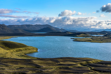 Scenic panorama of clear lake and mountains, Landmannalaugar, Iceland