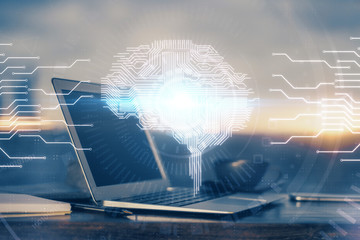 Multi exposure of work space with computer and human brain hologram. Brainstorm concept.