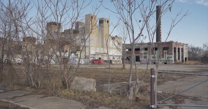 View of an established shot of abandoned manufacture building in Detroit, Michigan. This video was filmed in 4k for best image quality.