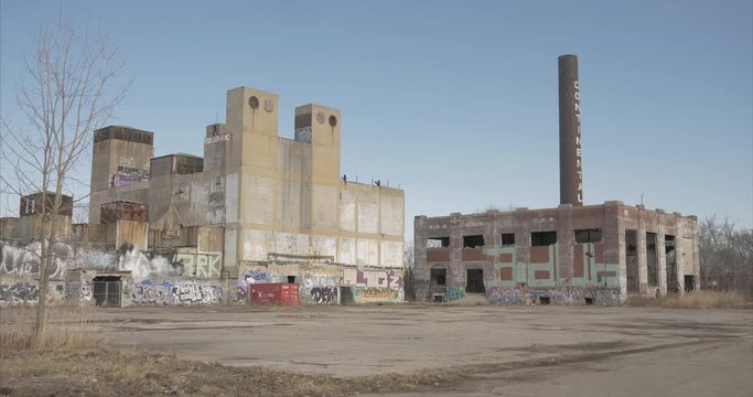 View of an established shot of abandoned manufacture building in Detroit, Michigan. This video was filmed in 4k for best image quality.