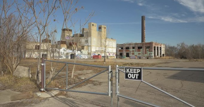 View of an established shot of abandoned manufacture building in Detroit, Michigan. This video was filmed in 4k for best image quality.