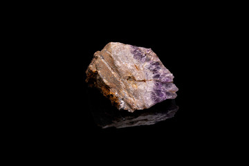 Purple rough Amethyst quartz crystals geode isolated on black