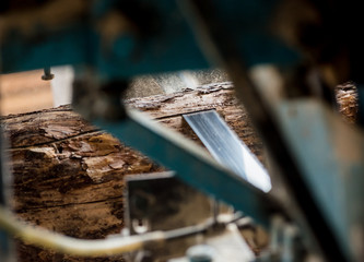 Modern sawmill. Industry sawing boards from logs
