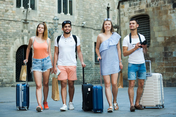 Group of our happy young people tourists