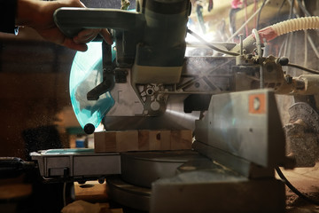 Workshop with tools and electric saws in the process