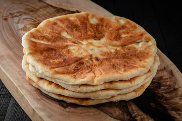 Homemade pies with cottage cheese, potatoes, or minced meat. Filled puff pastry