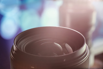 Equipment videographer and photographer. Lenses on the table against the background of bright...