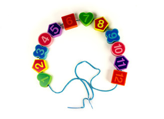 Colorful bright educational toys in the form of lacing for children.Educational toys. Bright...