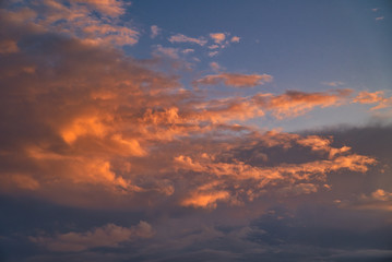 Naklejka na ściany i meble cloudy sky at sunset