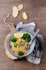 Warm pearl salad with vegetables