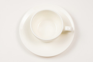 White cup isolated on white background.