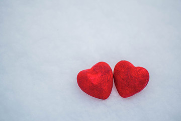 Fototapeta premium Snow hearts red winter two