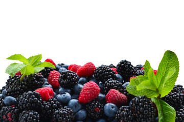 Blackberry, raspberry, blueberry and mint background.