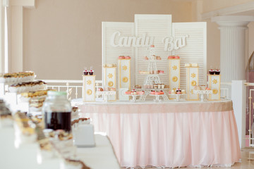Candy Bar. Delicious sweet buffet with cupcakes. Sweet holiday buffet with cupcakes and other desserts.