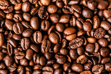 Coffee roasted beans background. Copy space for text.