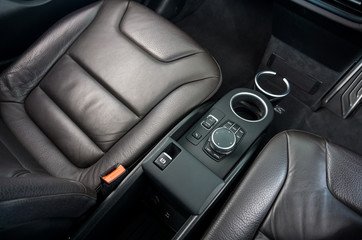 Top view of Car Interior with Driver, Passenger seat and cup holder on background. Modern Car Interior Design.
