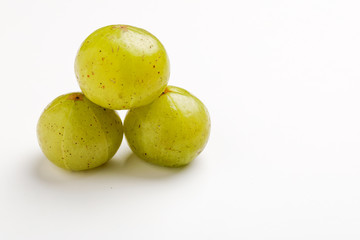 Fresh Indian gooseberry over white background