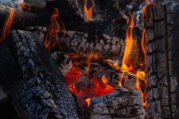 Fire woods and hot coal in a grill