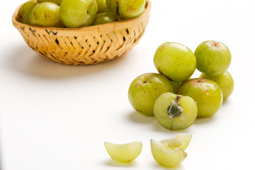 Fresh Indian gooseberry in wooden  bowl 